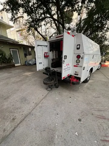 Magnet Plumbing service vehicle on-site for Water Heater Repair in San Juan